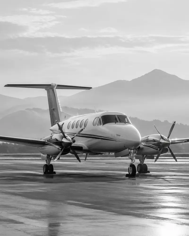 Twin turboprop aircraft on a mountain airfield