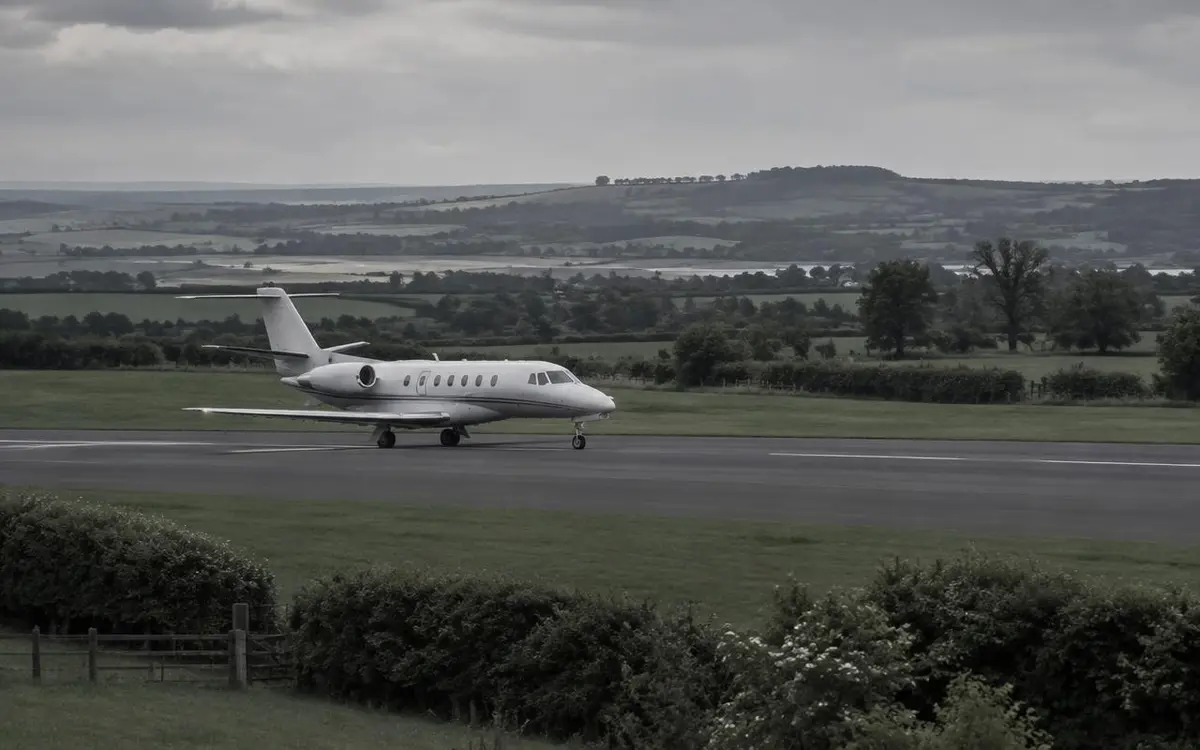 Business jet on a countryside runway in southeast England